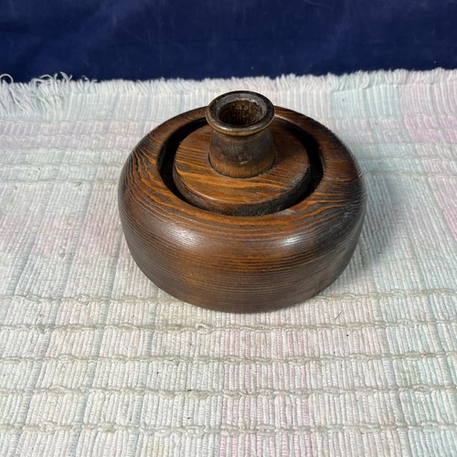 Wooden candle holder with wax - holder,